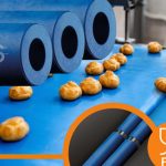 Blue FDA-compliant knife edge rollers from igus for maximum belt speeds